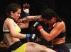 Ashlee Evans-Smith punching Veronica Macedo from UFC Facebook