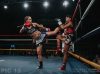 Kim Townsend kicking Loma Lookboonmee at Epic 15 by Emanuel Rudnicki Fight Photography