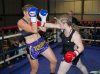 Lauren Huxley punching Candida Taylor by Richard Velardo Photography
