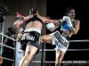 Leonie Macks punching Claire Baxter at Rebellion MT XII by William Luu Fight Photography