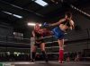 Mandana Rafat kicking Ciara Doyle by Tierney Photography for FightStore Media