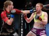 Alexa Conners punching Laura Howarth at Invicta FC 17 by Esther Lin