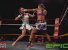 Alicia Pestana punching Yolanda Schmidt at Epic 15 by Brock Doe Fight Photography