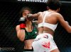 Angela Hill punching Livia Renata Souza at Invicta FC 17 by Esther Lin