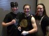Brigid (left), Elizabeth (right) with sister Hope Chase with her Bizzarro Promotions Bantamweight Championship title
