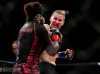 Charmaine Tweet spinning back fist to Latoya Walker at Invicta FC 17 by Esther Lin