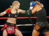 Hilary Herman punches Caressa Kibler by Mark Neustaedter Photography