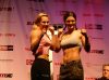 Julie Kedzie and Gina Carano posing after weigh-ins at 1st Elite XC