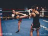 Kim Townsend at Epic 9 kicking Sylvia Scharper by Emanuel Rudnicki Fight Photography 2