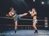 Kristan Armstrong kicking Kim Townsend at Epic 10 by Emanuel Rudnicki Fight Photography