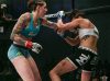 Megan Anderson punching Amber Leibrock Invicta FC 15 by Scott Hirano