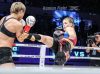 Michaela Michl kicking Wang Kehan at Kunlun Fight