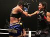 Miriam Nakamoto punching Angela Rivera Parr by Marty Rockatansky Photography