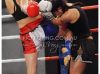 Natalie Edwards kneeing opponent at Rumble in the Jungle 28 by Tony Vorg