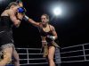 Noemi Bosques punching Michelle Preston at Royal Rampage by Calden Jamieson Photography