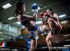 Pia Salgado kicking Yolanda Schmidt at Siam 2 Sydney by William Luu Fight Photography