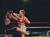 Stephanie Glew at Epic 13 elbowing Gemma Pike by Emanuel Rudnicki Fight Photography