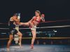Stephanie Glew at Epic 13 kicking Gemma Pike by Emanuel Rudnicki Fight Photography