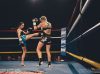 Suthida Upala kicking Chantel Jones at Epic 13 by Emanuel Rudnicki Fight Photography