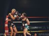 Suthida Upala punching Chantel Jones at Epic 13 by Emanuel Rudnicki Fight Photography