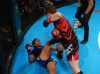 Danni Neilan (red) punching Michele Oliveira (blue) at 2017 IMMAF Worlds by Jorden Curran Photography