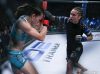 Ashley Cummins punching Jinh Yu Frey at Invicta FC 24 by Scott Hirano
