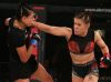 DeAnna Bennett punching Karina Rodriguez at Invicta FC 28 by Dave Mandel