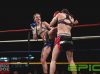 Madelaine Duiker kicking Nicola Callander at Epic 17 by Brock Doe Fight Photography
