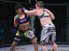 Pamela Sorenson punching Ediane Gomes at Invicta FC 23 by Scott Hirano