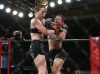 Sarah Kleczka punching AmberLynn Orr at Invicta FC 25 by Scott Hirano
