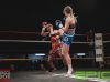 Saskia Vaughan kicking Crystel Carlow at Epic 17 by Brock Doe Fight Photography
