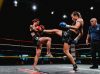 Stephanie Glew kicking Anita Boom at Epic 16 by Emanuel Rudnicki Fight Photography