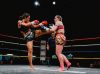 Victoria Callaghan kicking Saskia Vaughan at Epic 16 by Emanuel Rudnicki Fight Photography