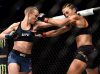 Rose Namajunas punching Joanna Jedrzejczyk at UFC 217 from UFC Facebook