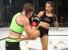 Alesha Zappitella kicking Jillian DeCoursey at Invicta FC 30 by Dave Mandel