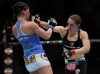 Alexis Davis punching Jessica Eye at UFC 170 from UFC Facebook