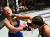 Amanda Nunes punching Ronda Rousey at UFC 207 from UFC Facebook