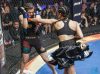 Amanda Serrano punching Corina Herrera at Combate Americas 20