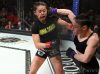 Anastasia Nikolakakos punching Ashley Medina at Invicta FC 33 by Dave Mandel