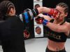 Ashley Cummins punching Jessica Delboni at Invicta FC 32 by Dave Mandel