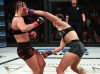 Brittney Victoria punching Sarah Kleczka at Invicta FC 33 by Dave Mandel
