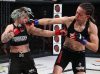 Cheri Muraski punching Liz Tracy at Invicta FC 29 by Dave Mandel