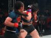 Danielle Taylor punching Montserrat Ruiz at Invicta FC 33 by Dave Mandel