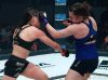 Erin Blanchfield punching Tracy Cortez at Invicta FC 34 by Dave Mandel