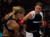 Gina Carano punching Cristiane Justino by Esther Lin for Strikeforce