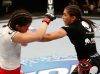Jessica Andrade punching Rosi Sexton at UFC Fight Night 30 from UFC Facebook