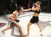 Jinh Yu Frey punching Minna Grusander at Invicta FC 30 by Dave Mandel
