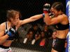 Joanna Jedrzejczyk punching Juliana Lima at UFC on Fox 12 from UFC Facebook