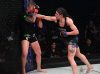 Julia Avila punching Alexa Conners at Invicta FC 32 by Dave Mandel