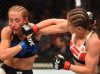 Karolina Kowalkiewicz punching Heather Jo Clark at UFC Fight Night 87 from UFC Facebook